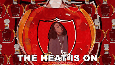 A Cartoon Of A Woman In A Shield With The Words The Heat Is On Below Her GIF