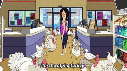 A Cartoon Of A Woman In A Store Surrounded By Turkeys And Ducks With The Caption I 'M The Alpha Turkey GIF