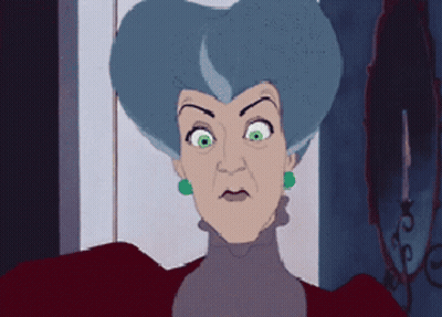 A Cartoon Of A Woman With Blue Hair And Green Earrings GIF