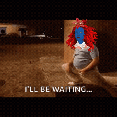 A Cartoon Of A Woman With Red Hair And The Words " I 'Ll Be Waiting " GIF