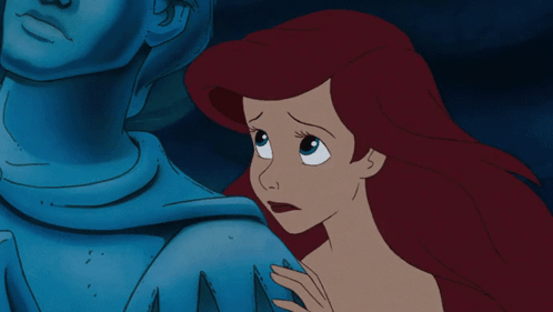 A Cartoon Of A Woman With Red Hair Looking At A Blue Statue GIF