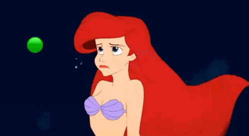 A Cartoon Of Ariel From The Little Mermaid Is Looking At A Green Ball . GIF