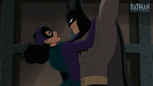 A Cartoon Of Batman And Catwoman Kissing With The Words My Hero Below Them GIF