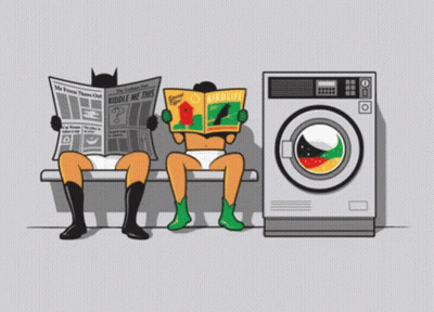 A Cartoon Of Batman And Robin Reading Newspapers Next To A Washer GIF