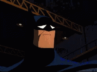 A Cartoon Of Batman With His Eyes Closed And A Sad Look On His Face GIF