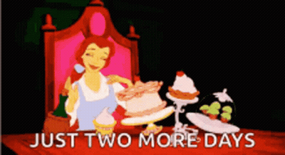 A Cartoon Of Belle From Beauty And The Beast Sitting At A Table With Cupcakes And A Cake GIF