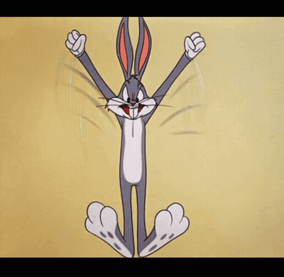 A Cartoon Of Bugs Bunny Sitting In A Lotus Position With His Fists In The Air GIF