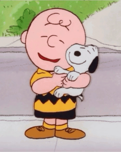 A Cartoon Of Charlie Brown And Snoopy Hugging GIF