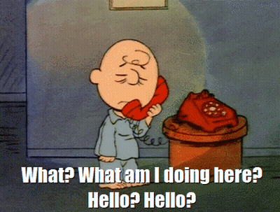 A Cartoon Of Charlie Brown Talking On A Red Phone GIF