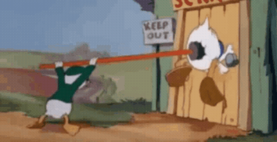 A Cartoon Of Donald Duck Holding A Stick In Front Of A Building . GIF