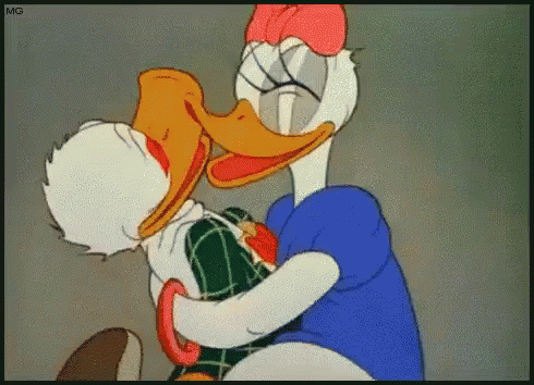 A Cartoon Of Donald Duck Kissing Daisy Duck On The Cheek GIF