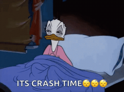 A Cartoon Of Donald Duck Laying In Bed With The Words " Its Crash Time " Above Him GIF