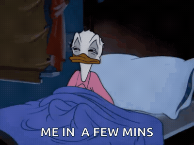 A Cartoon Of Donald Duck Laying In Bed With The Words " Me In A Few Mins " Above Him GIF