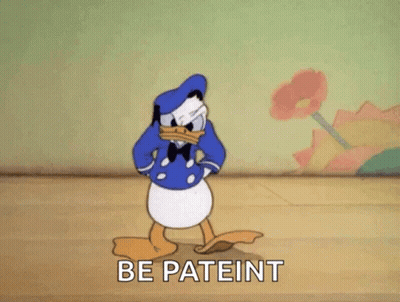 A Cartoon Of Donald Duck Standing On A Wooden Floor With The Words `` Be Patient '' Written On The Bottom . GIF