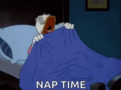 A Cartoon Of Donald Duck Yawning While Holding A Blue Blanket In A Bed . GIF