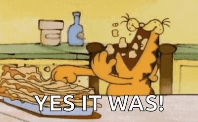 a cartoon of garfield eating a pie with the words `` yes it was ! ''