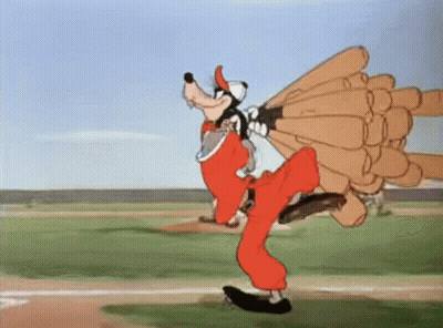 A Cartoon Of Goofy Carrying A Bunch Of Baseball Bats On His Back GIF