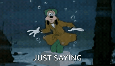 A Cartoon Of Goofy Is Standing On A Pedestal With The Words Just Saying Behind Him . GIF