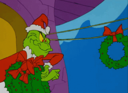 A Cartoon Of Grinch Hanging Christmas Wreaths From A String GIF