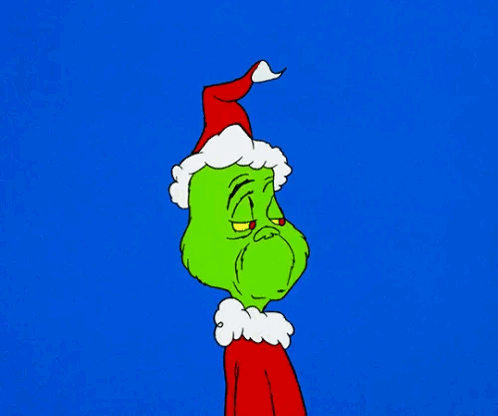 A Cartoon Of Grinch With A Santa Hat On GIF