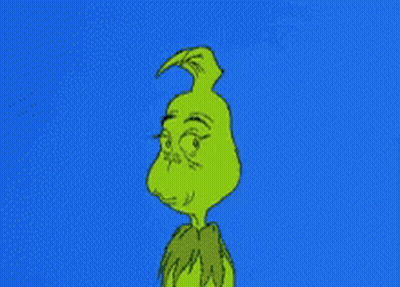 A Cartoon Of Grinch With A Very Angry Face On A Blue Background GIF