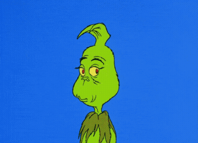 A Cartoon Of Grinch With A Very Angry Look On His Face GIF