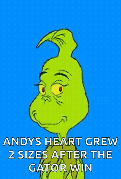 A Cartoon Of Grinch With The Caption Andy 'S Heart Grew 2 Sizes After The Gator Win . GIF