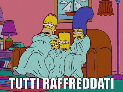 A Cartoon Of Homer Simpson And Bart Simpson Sitting On A Couch With The Words Tutti Raffreddati Above GIF