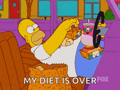 A Cartoon Of Homer Simpson Driving A Car Eating A Bag Of Chips GIF