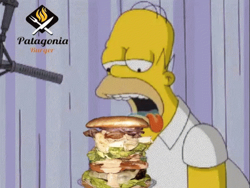 A Cartoon Of Homer Simpson Eating A Hamburger With Patagonia Burger In The Background GIF