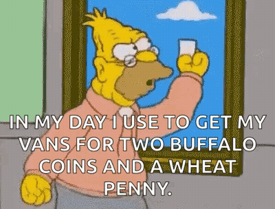 A Cartoon Of Homer Simpson Holding A Glass Of Milk GIF