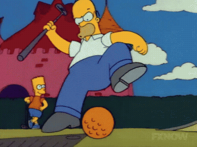 A Cartoon Of Homer Simpson Kicking An Orange Ball With Fxnow Written On The Bottom GIF