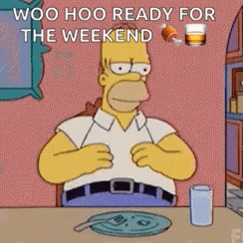 A Cartoon Of Homer Simpson Sitting At A Table With A Plate Of Food And A Glass Of Water . GIF