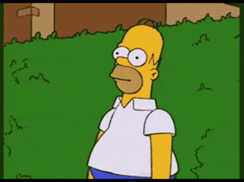 A Cartoon Of Homer Simpson Standing In A Grassy Yard GIF