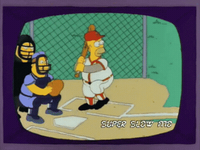A Cartoon Of Homer Simpson Swinging A Baseball Bat With The Words Super Slow And On The Screen GIF