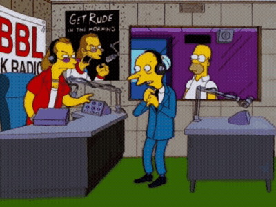 A Cartoon Of Homer Simpson Talking Into A Microphone In Front Of A Poster That Says Get Rude In The Morning GIF