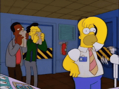 A Cartoon Of Homer Simpson Wearing A Name Tag That Says ' E ' On It GIF