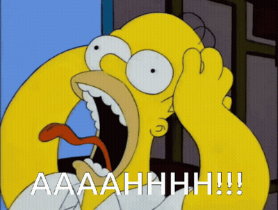 A Cartoon Of Homer Simpson With A Surprised Look On His Face And The Words Aaahhhh Written In White GIF