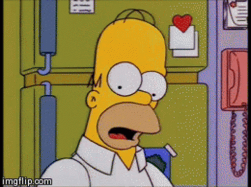 A Cartoon Of Homer Simpson With A Surprised Look On His Face Is Displayed On Imgflip.com GIF