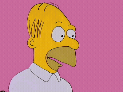 A Cartoon Of Homer Simpson With His Mouth Open And His Tongue Hanging Out GIF