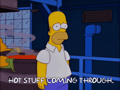 A Cartoon Of Homer Simpson With The Words Hot Stuff Coming Through Below Him GIF