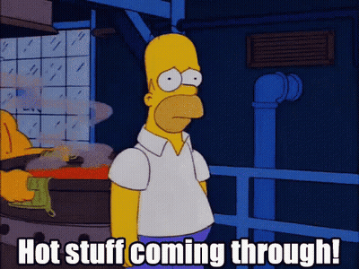 A Cartoon Of Homer Simpson With The Words Hot Stuff Coming Through Written Below Him GIF