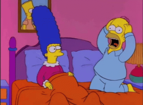 A Cartoon Of Homer Simpson Yelling At Marge Simpson GIF