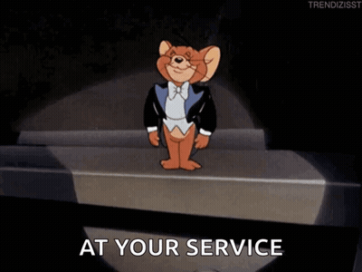 A Cartoon Of Jerry In A Tuxedo With The Words At Your Service Above Him GIF