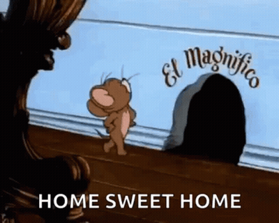 A Cartoon Of Jerry Running Towards A Mouse Hole With The Words `` Home Sweet Home '' . GIF