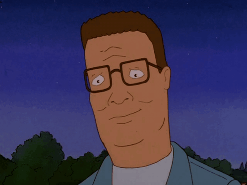 A Cartoon Of King Of The Hill Wearing Glasses And A Blue Shirt GIF