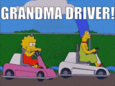 A Cartoon Of Lisa Simpson And Marge Simpson Driving Golf Carts With The Words Grandma Driver Above Them GIF