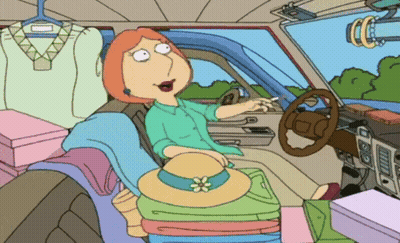 A Cartoon Of Lois Griffin Sitting In A Car Full Of Clothes GIF