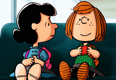 A Cartoon Of Lucy And Patty From Peanuts Sitting Next To Each Other On A Couch GIF