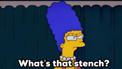 A Cartoon Of Marge Simpson With Blue Hair And The Words `` What 'S That Stench ? '' GIF